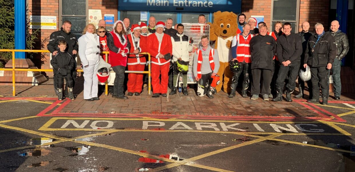 Scunny Bikers and staff stood outside the hospital