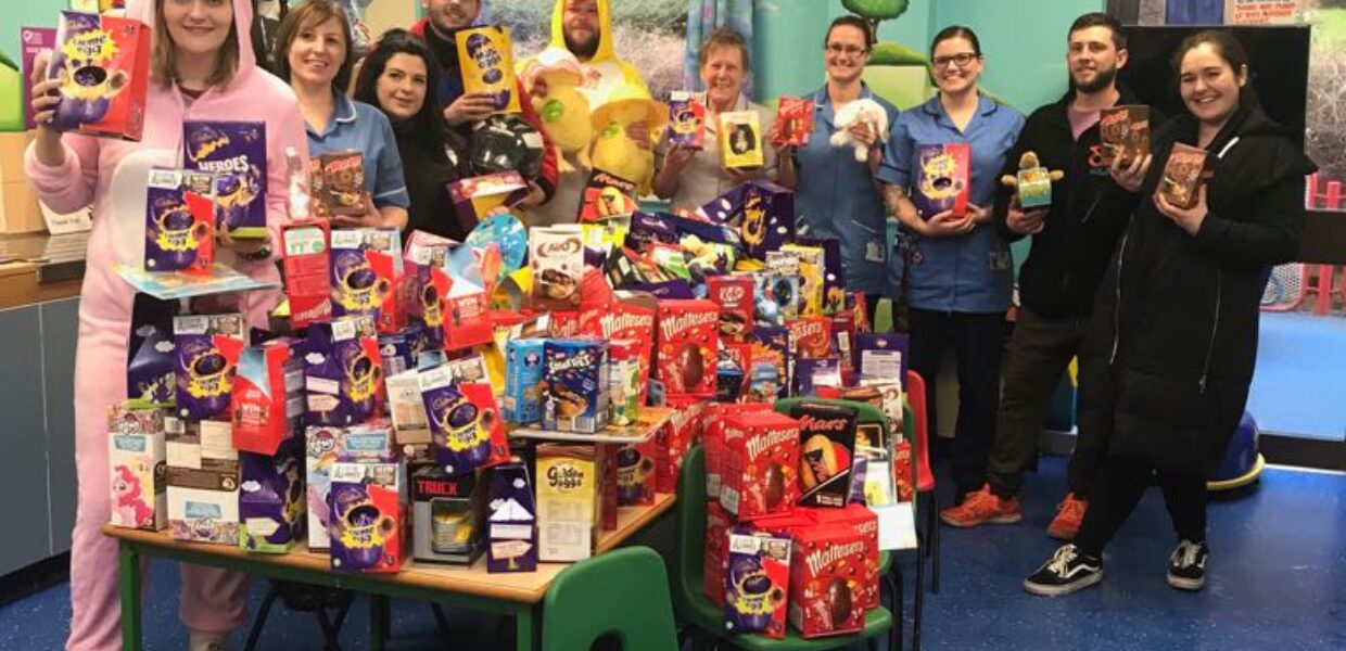 Scunny Bikers pictured with staff and Easter eggs on the Disney Ward